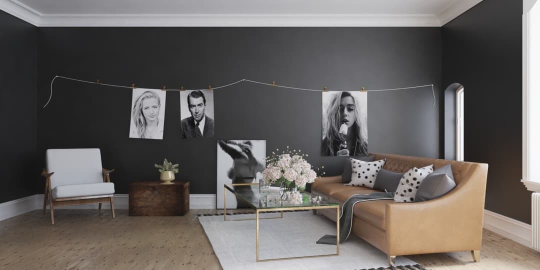Phối cảnh phòng khách với sofa da, chất liệu gỗ và ánh sáng bên cửa sổ